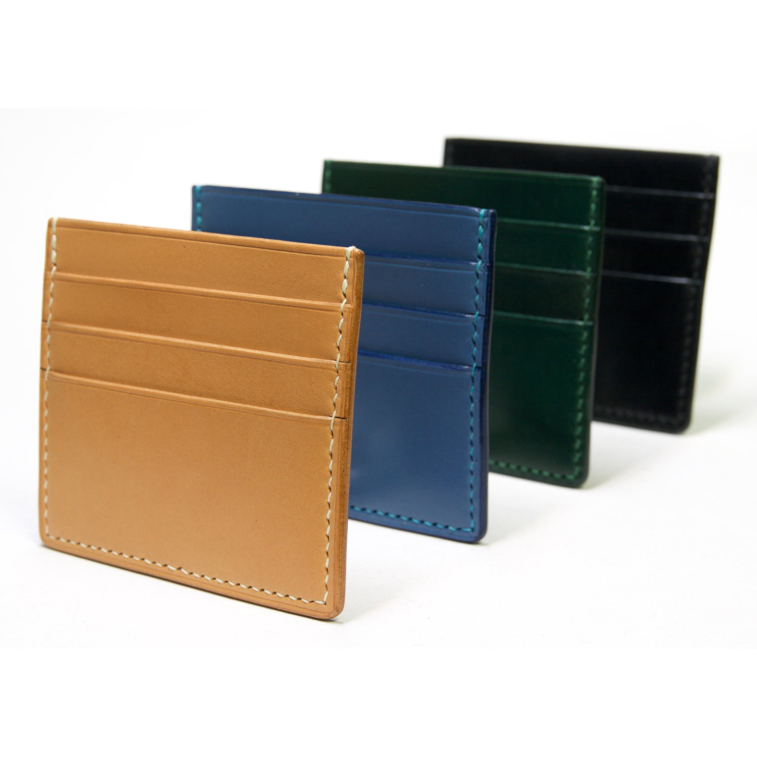 leather cardholders standing in a row front view