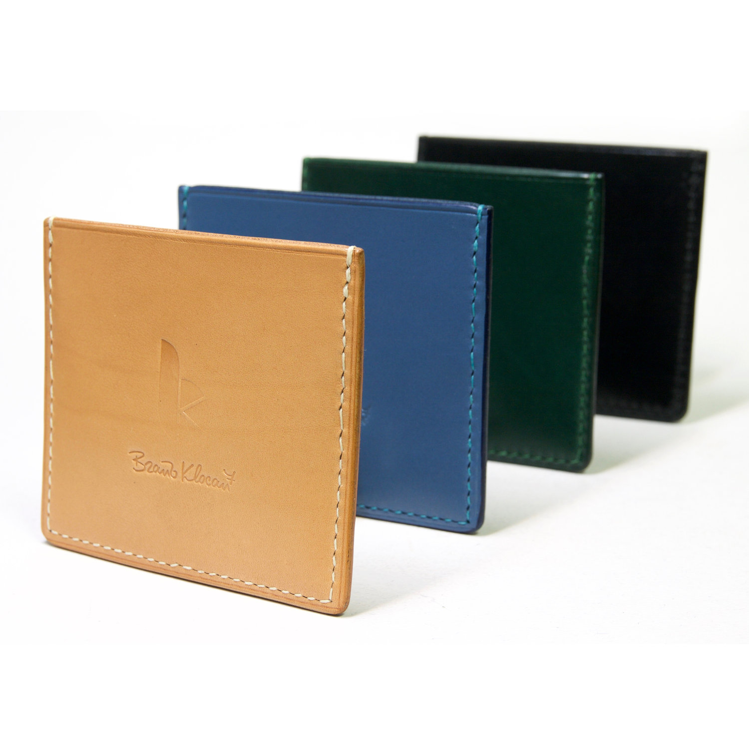 leather cardholders standing in a row rear view