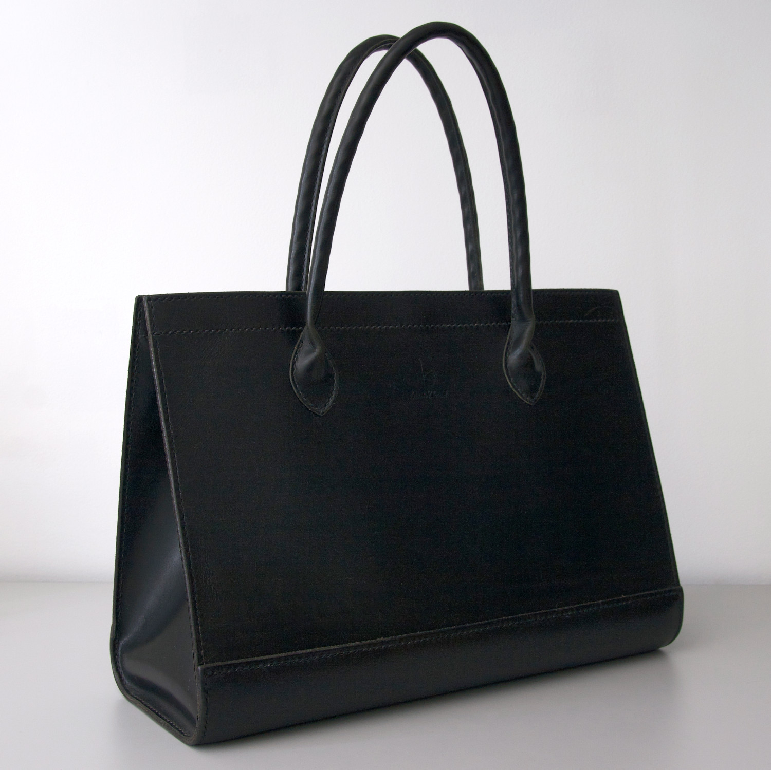 leather tote bag with round handles