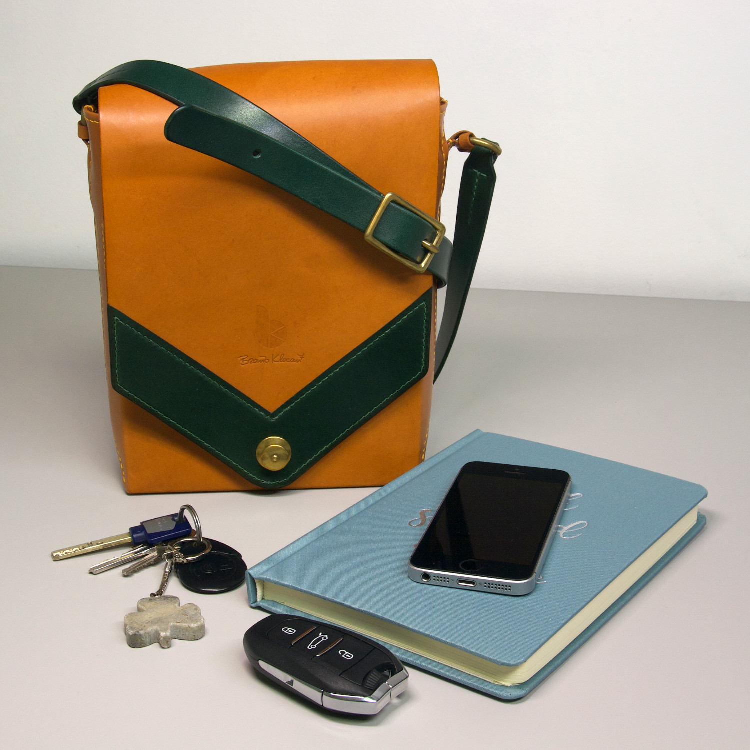 leather messenger bag with diary mobile car keys